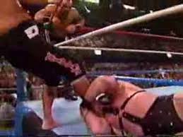 Luger wins vacant wcw world title). Barbarian Oww