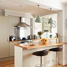 Apr 07, 2020 · start small by creating a wallpapered accent wall, turning a drab corner into a cozy dining nook, lining the back of your cabinets or shelves with wallpaper, or adding some flavor—of the visual variety—to your pantry. Neutral Kitchen With Wooden Painted Island Decorating Ideal Home Kitchen Design Modern Kitchen Diner Kitchen Remodel