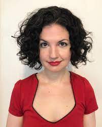 Dark Undercut Bob With Layers And Curly Texture The Latest Hairstyles For Men And Women 2020 Hairstyleology Curly Hair Styles Undercut Hairstyles Bob Haircut Curly