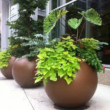 Choose a wooden or metal trough to enhance a. Globe Spherical Planter Pot In 2021 Large Outdoor Planters Planter Pots Outdoor Outdoor Planters