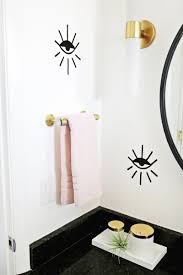 Get towel racks with shelves. Try This Lucite Hand Towel Holder A Beautiful Mess
