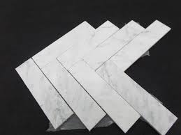 It's been our late bloomer you could say. China Natural White Grey Marble Herringbone Mosaic Tiles For Kitchen Bathroom Flooring China Mosaic Herringbone Mosaic