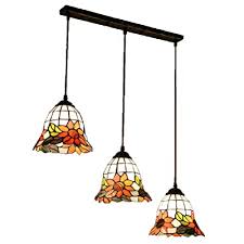 One, creating a larger pool of light. Buy Tiffany Sunflower Glass Dining Room Ceiling Pendant Light Round Top European Restaurant Bar Counter Pendant Lamp American Country Rustic Glass Hanging Lamp Oblong Top Online In India B014883w9a