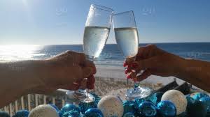 Champagne with just a splash of white creme de cacao and a candy cane garnish are all you need for the most festive. The Sparkle Of Champagne For A Beachy Christmas Stock Photo F007a148 6a1c 4f45 Ad8f F6b6f69f267c