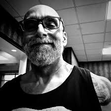 You remember when John Romita drew the Peter Parker's eyes behind the  Spider-Man's mask? This is an homage to that period.