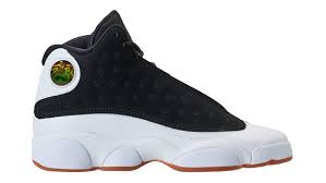 Dressed in a white, university gold, and black color scheme. Air Jordan 13 Retro Gg Black Metallic Gold White Gum Medium Brown Jordan Sole Collector