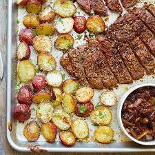 Cook the steaks in the oven for eight to 12 minutes. Sheet Pan Steak And Potatoes Recipe Eatwell101