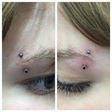 These Paired Eyebrow Piercings Were Done Using Neometal Curved Barbells And They Look Great Eyebrow Piercing Piercings Eyebrows