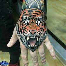 Pin By Ashton Hill On Tattoos Hand Tattoos For Guys Tiger Hand Tattoo Japanese Hand Tattoos