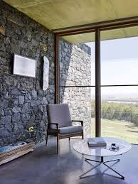Check spelling or type a new query. This House With Bluestone Walls Overlooks The Landscape Below