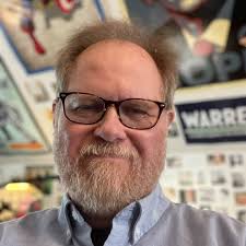 The display table. Every couple of months it varies from new book to theme  releases, community knitting challenges with all garments going to people  in need. Upcoming Author visits & their books.