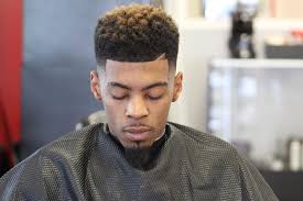 Black guy mohawk is a great haircut to create a smooth transition from short hair at the back of the head to any desired length at the crown. Top 30 Amazing Black Men Haircuts For 2019