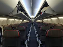 American airlines announced thursday that it will make its basic economy fares a little less basic. American Will Soon Stop Making You Gate Check Your Carry On Bags View From The Wing