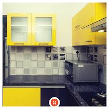 In The Kitchen You Will Find A Catchy Modular Unit Cupboards Overhead And Below With A Chimney And Hob In Marigold And Slate Grey Modular Unit Home Laminates