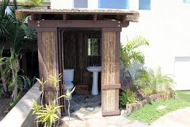 A teak stool sits beside the tub for easy placement of towels and shampoos. Outdoor Bathroom Shower Tropical Landscape San Diego By Full Circle Design Remodeling Houzz
