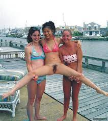 Two friends holding up a naked one. Porn Pic - EPORNER