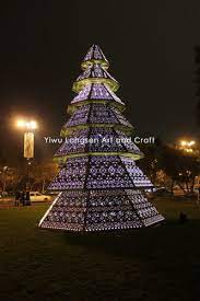 Trees decorated with light strings always look festive for the holidays, and they can be just as fun and magical any other time of the year. China 10 M Giant Steel Structure Xmas Tree Fancy Polygonal Led Christmas Giant Tree Decorations Accepts Special Specification Order China Christmas Tree And Giant Tree Price