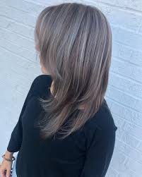 As we have said before, the key to wearing long hairstyles is to avoid dragging down and hardening effect by choosing flattering, bouncy, and layered 'dos. The Hottest Shades And Highlights For Gray Hair It S Rosy