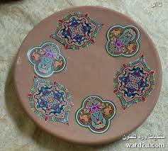 كراكليه و زخارف نباتية على طبق فخار tableware plates handicraft