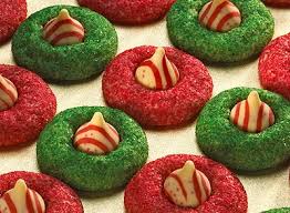 Immediately press candy kisses firmly into each cookie, cool. Hershey Kisses Candy Cane Blossom Cookies Recipe