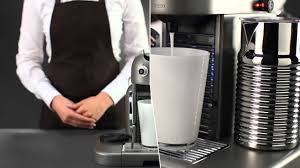 To enter the descaling mode, while the machine is turned on, press both the espresso and lungo buttons for 3 seconds. Nespresso Gran Maestria How To Descale Your Gran Maestria Machine Youtube