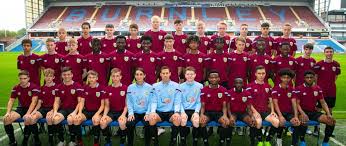 Environmental sustainability and social responsibility within football. Full Squad Burnley Fc In The Community
