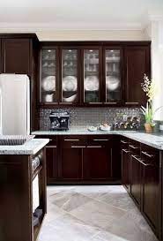 This kitchen design from inool matches the espresso kitchen cabinets with the counter and a brown marble countertop. Lighter Counters Some Glass Cupboards Diseno Muebles De Cocina Decoracion De Cocina Decoracion De Cocina Moderna