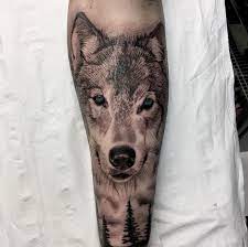 Black And Grey Ink Realistic Wolf Tattoo By Fervescent Wolf Tattoos Animal Tattoo Wolf Tattoo