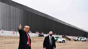 A us border patrol agent walks along the border at the imperial sand dunes, near felicity, california, in november 2016. President Trump Extends National Emergency Declaration At U S Mexico Border Borderreport