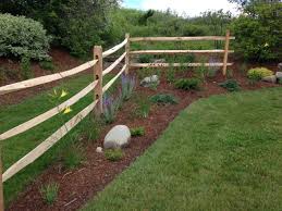 Creating a split rail fence garden. Recent Projects Di Stefano Landscaping