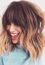 Long curly hairstyles with bangs wavy hair easy women stock photos … the hairstyles of medium length hairstyles for curly hair | hairjos.com. Looking For Best Bangs Haircuts To Sport With Ombre Colors There Are A Lot Variations Of Haircuts Which Y Hair Styles Thick Hair Styles Strawberry Blonde Hair
