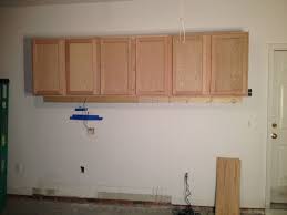 We live in a do it yourself era. Diy Garage Cabinets With Under Cabinet Lighting For Tron Grease Monkeys Homecrux Diy Cabinets Garage Wall Cabinets Diy Garage Cabinets