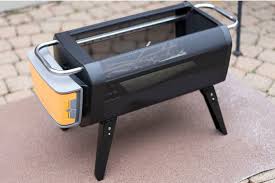 Lift the fuel rack and toss in charcoal to transform it from a fire pit to a portable hibachi style grill, complete. Biolite Firepit Review
