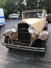 Image result for Scaraba Green 1930 Oldsmobile