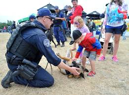 Petty Officer 2nd Class James Grant A Maritime Enforcement Specialist And Dog Handler Assigned To Maritime Safety And Working Dogs Coast Guard American Pride