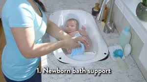 It's easiest to use the kitchen sink or a small plastic baby tub filled with warm water instead of a standard tub. Summer Infant Right Height Bath Tub Youtube