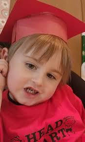 Officer helps child in need with new bed and gifts