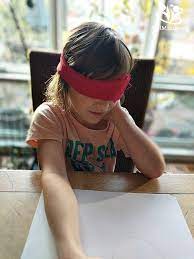 I'm going to start the list with a classic blindfold game for kids that most people would already know — pin the tail on the donkey. Blindfold Drawing An Opportunity To Laugh With Our Kids Kidminds