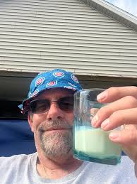 Enjoying blueberry muffin wine and Cubs gear