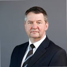 The sun rising to the east as Wicklow Head lighthouse and Brides Head looks  on. It's not often you get to anchor in your own backyard. Commissioners of  Irish Lights ILV Granuaile