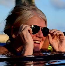 What to do when temporary visa is not issued to spouse at Cancun Airport?