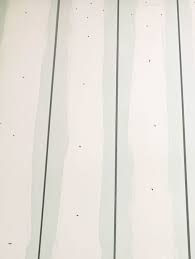 Plenty of shiplap baords to choose from. How To Install A Vertical Shiplap Wall Abby Lawson