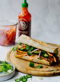 Cut the baguette in half and then slice each baguette lengthwise to open. Tofu Banh Mi Sandwich Recipe Snacks Appetizer Klara S Life