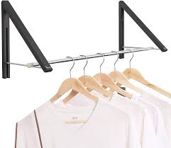 Tidyhangers is an elegant and versatile clothes hanger rack, coat hook that can be installed in an infinite number of combinations. Amazon Com Anjuer Retractable Clothes Rack Wall Mounted Folding Clothes Hanger Drying Rack For Laundry Room Closet Storage Organization Aluminum 2 Racks With Rod Black Kitchen Dining