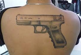 Check spelling or type a new query. 45 Amazing Gun Tattoo Designs