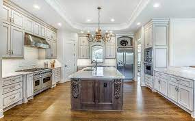 Neutral colors such as light browns and shades of white call attention to the cabinetry. Walnut Hardwood Flooring Design Ideas Designing Idea