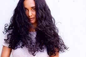 A south african woman of east indian descent, now living in canada. Elodie Venece
