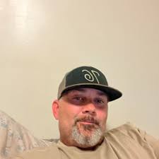 Who is a good local tattoo artist in Franklin, NC for adding to current  work?