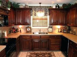 cabinet above kitchen sink window