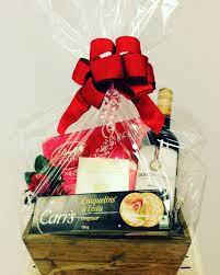 Anniversary Gift Basket With Red Wine Cheese And Crackers And A Box Lindt Chocolate Lindt Chocolate Gift Ideas Anniversary Gift Baskets Candy Bar Cake